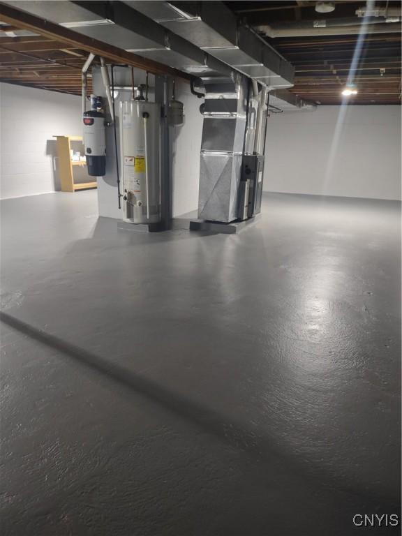 7408 Rome Oriskany Rd, Rome, NY 13440 - unfinished below grade area featuring gas water heater and heating unit