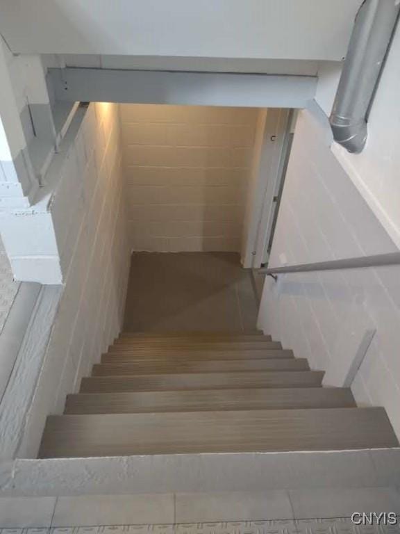 7408 Rome Oriskany Rd, Rome, NY 13440 - stairway featuring tile patterned flooring