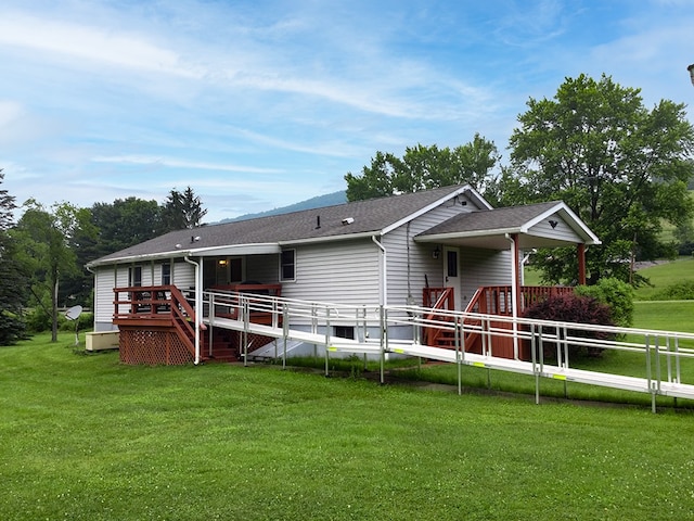 8198 Rte 46, Keating Town, PA 16749 - back of property featuring a yard, a wooden deck, and roof with shingles