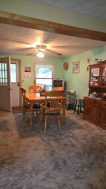 8198 Rte 46, Keating Town, PA 16749 - carpeted dining area featuring a textured ceiling, ceiling fan, and beamed ceiling