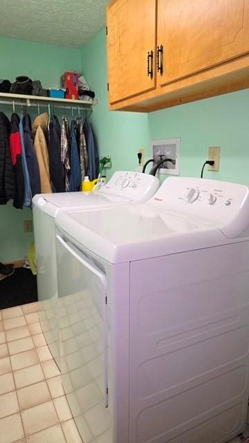 8198 Rte 46, Keating Town, PA 16749 - washroom with washer and clothes dryer, cabinet space, and a textured ceiling
