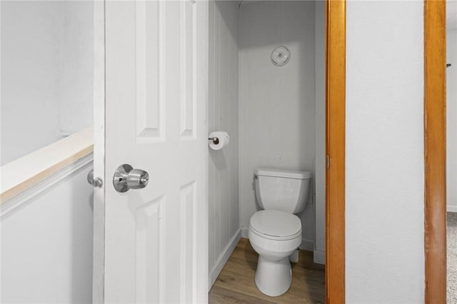 113 Myrtle St, Leroy, NY 14482 - bathroom with toilet and wood finished floors