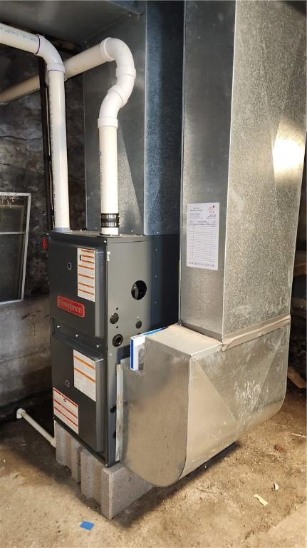 113 Myrtle St, Leroy, NY 14482 - utility room featuring heating unit