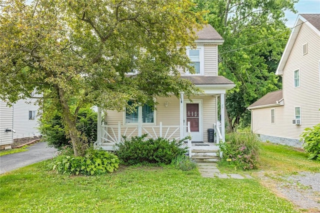 113 Myrtle St, Leroy, NY 14482 - view of front facade featuring covered porch and a front yard