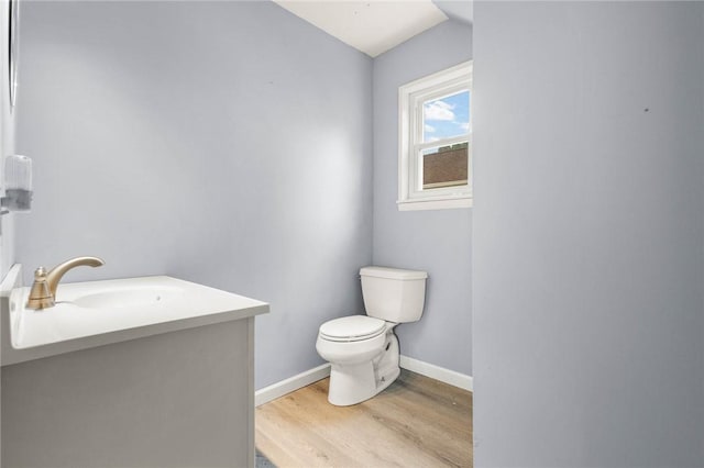 113 Myrtle St, Leroy, NY 14482 - bathroom featuring wood finished floors, vanity, and lofted ceiling