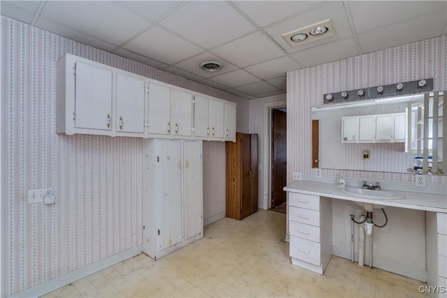 7259 Number Four Rd, Watson, NY 13367 - bathroom with tile patterned floors, wallpapered walls, and a paneled ceiling