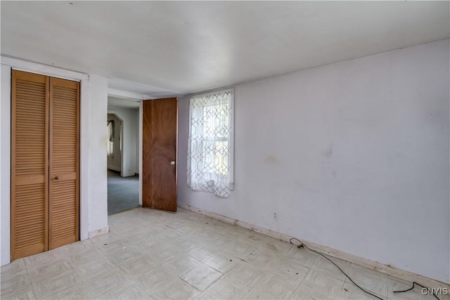 7259 Number Four Rd, Watson, NY 13367 - unfurnished bedroom featuring light flooring and a closet