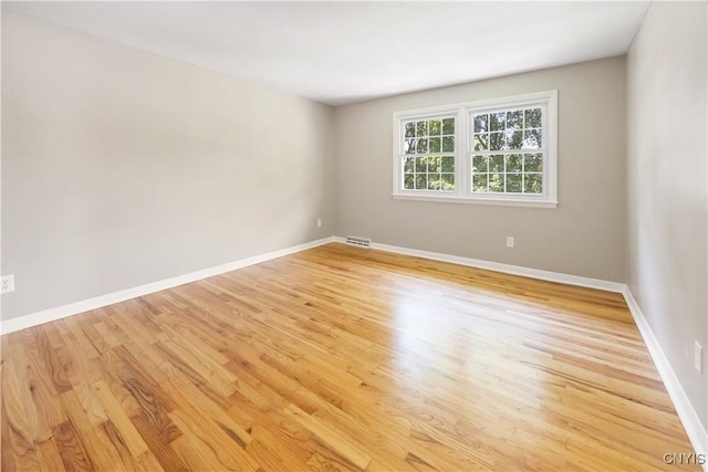 14 Ibis, Clay, NY 13090 - unfurnished room featuring light wood-type flooring