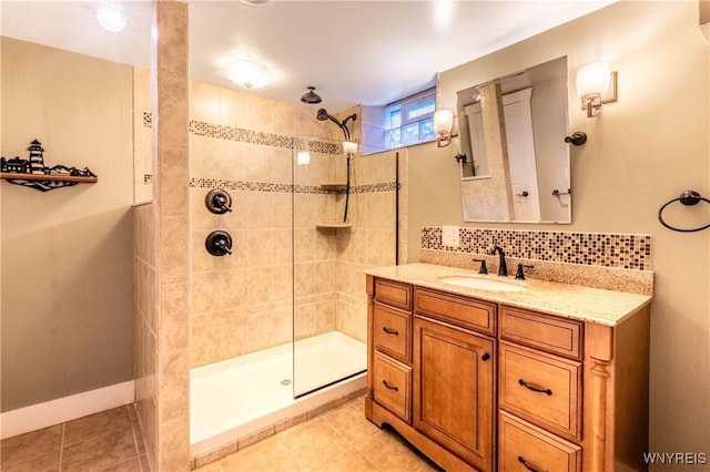 52 Harbor St, Wilson, NY 14172 - bathroom with walk in shower, vanity, tasteful backsplash, and tile patterned flooring