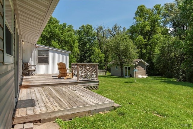16 Vine Cir, Whitestown, NY 13492 - deck with a yard, an outbuilding, and view of wooded area