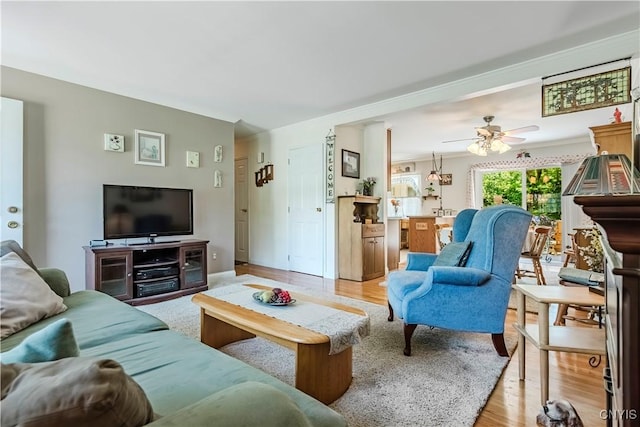16 Vine Cir, Whitestown, NY 13492 - living room with light wood finished floors and ceiling fan