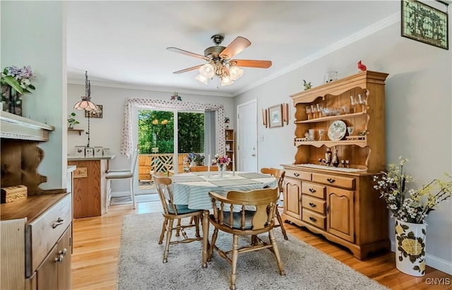16 Vine Cir, Whitestown, NY 13492 - dining area with ceiling fan, ornamental molding, light wood-type flooring, and radiator heating unit
