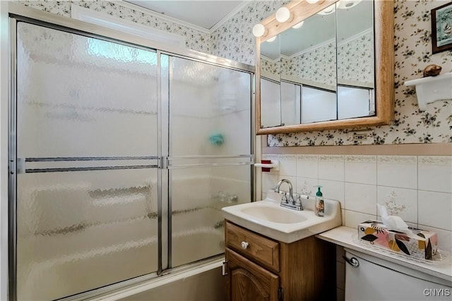 16 Vine Cir, Whitestown, NY 13492 - full bathroom with wallpapered walls, vanity, combined bath / shower with glass door, and crown molding