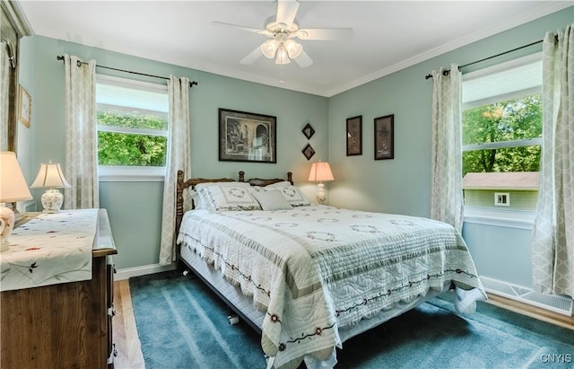16 Vine Cir, Whitestown, NY 13492 - bedroom featuring multiple windows, ceiling fan, wood finished floors, and crown molding