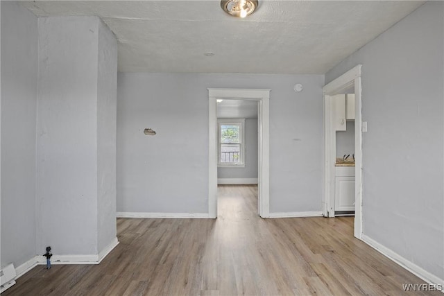 1810 Niagara St, Niagara Falls, NY 14303 - spare room featuring wood finished floors and baseboards