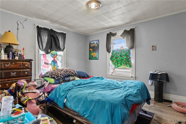 1810 Niagara St, Niagara Falls, NY 14303 - bedroom featuring wood finished floors and ornamental molding