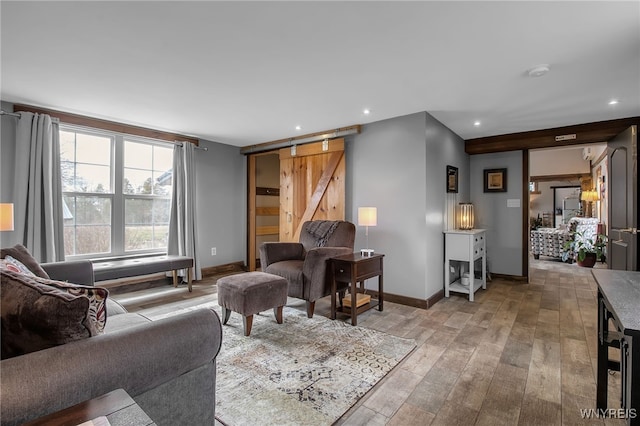 2244 Lockport Olcott Rd, Newfane, NY 14108 - living area with a barn door, recessed lighting, and light wood-style floors