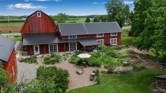 2244 Lockport Olcott Rd, Newfane, NY 14108 - back of house with a barn and a metal roof