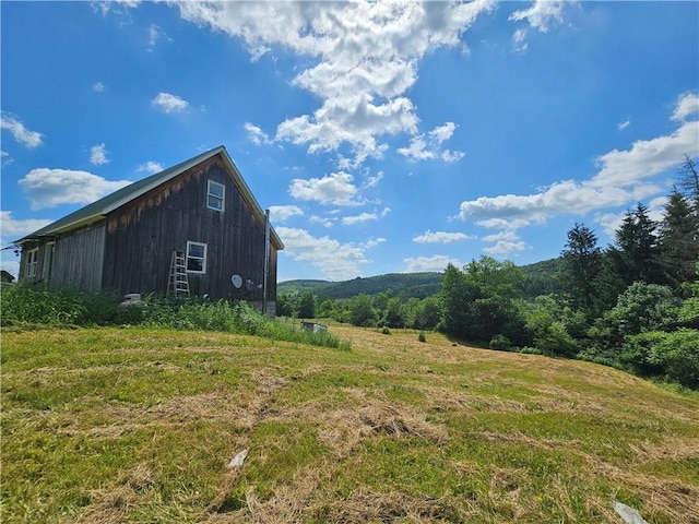 2857 County Route 84, Troupsburg, NY 14885 - view of side of home featuring an outbuilding and a barn