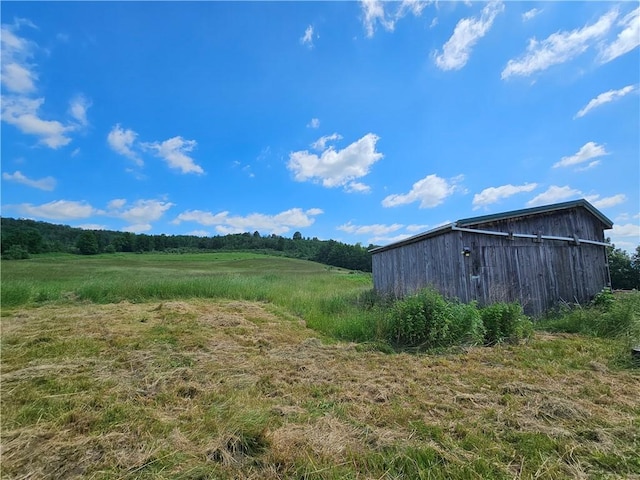 2857 County Route 84, Troupsburg, NY 14885 - view of yard with an outdoor structure and a view of rural / pastoral area