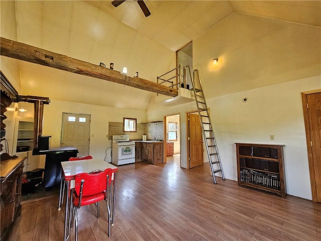 2857 County Route 84, Troupsburg, NY 14885 - dining room with high vaulted ceiling, a ceiling fan, and dark wood-style floors