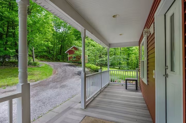 1565 Tupper Hill Rd, Franklin, NY 13775 - wooden porch with view of scattered trees