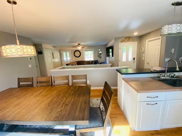 1565 Tupper Hill Rd, Franklin, NY 13775 - dining space featuring light wood finished floors and a ceiling fan