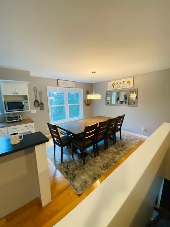 1565 Tupper Hill Rd, Franklin, NY 13775 - dining area featuring light wood finished floors