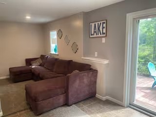 1565 Tupper Hill Rd, Franklin, NY 13775 - living area with baseboards and light tile patterned floors