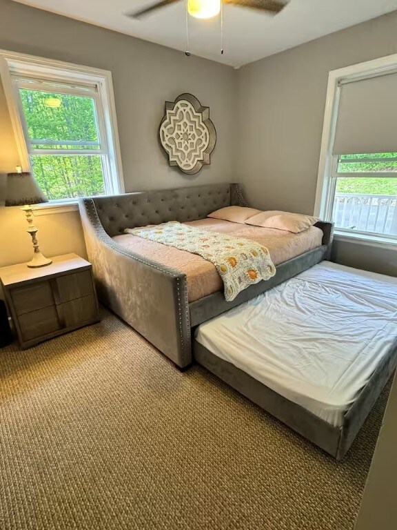 1565 Tupper Hill Rd, Franklin, NY 13775 - bedroom with a ceiling fan and light colored carpet