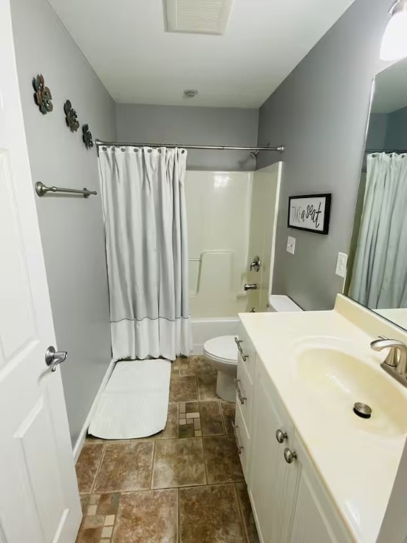 1565 Tupper Hill Rd, Franklin, NY 13775 - full bath featuring vanity, shower / bath combo with shower curtain, and stone finish floors