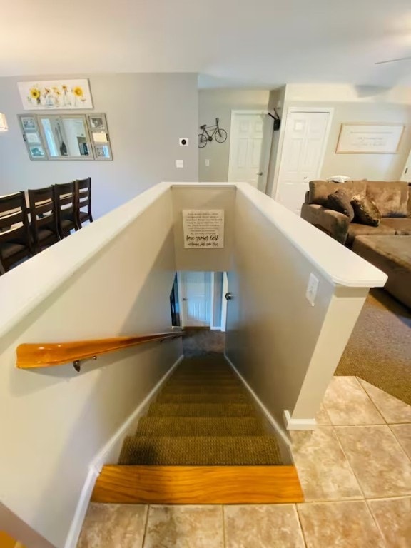1565 Tupper Hill Rd, Franklin, NY 13775 - stairs featuring tile patterned floors and carpet flooring
