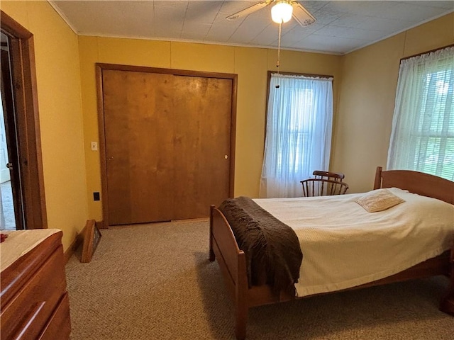 21 Main St, Maryland, NY 12155 - carpeted bedroom with a closet, ornamental molding, and a ceiling fan