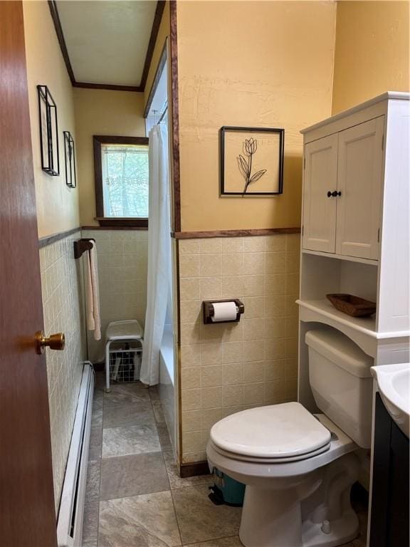 21 Main St, Maryland, NY 12155 - bathroom featuring a baseboard heating unit, tile walls, a wainscoted wall, ornamental molding, and vanity