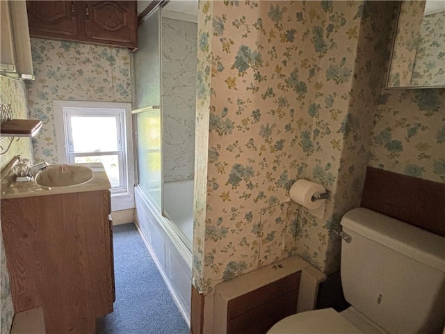 21 Main St, Maryland, NY 12155 - full bathroom with wallpapered walls, bath / shower combo with glass door, and vanity
