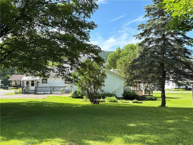 21 Main St, Maryland, NY 12155 - view of grassy yard with covered porch