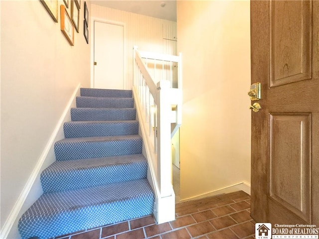 20 Elm Ln Unit E5, Chautauqua, NY 14722 - stairway featuring baseboards and tile patterned flooring