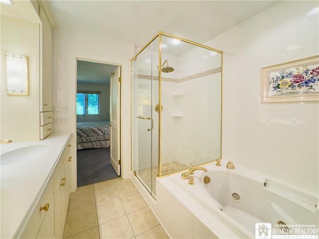 20 Elm Ln Unit E5, Chautauqua, NY 14722 - ensuite bathroom with a shower stall, tile patterned flooring, a tub with jets, and vanity