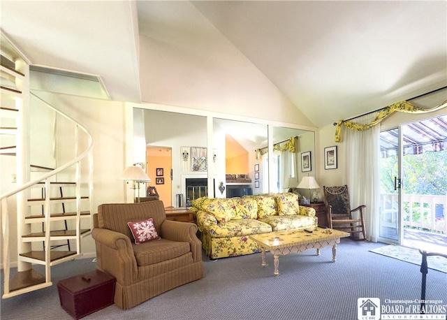 20 Elm Ln Unit E5, Chautauqua, NY 14722 - carpeted living room featuring high vaulted ceiling and stairway