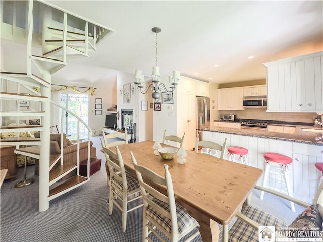 20 Elm Ln Unit E5, Chautauqua, NY 14722 - dining room with dark carpet, a chandelier, and recessed lighting