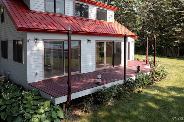 2761 E Lake Rd, Skaneateles, NY 13152 - rear view of house featuring a deck and a metal roof