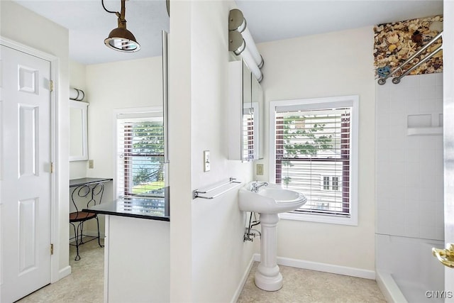 2761 E Lake Rd, Skaneateles, NY 13152 - full bathroom with baseboards and a shower