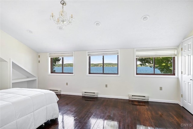 2761 E Lake Rd, Skaneateles, NY 13152 - bedroom with baseboard heating, a baseboard heating unit, multiple windows, and hardwood / wood-style flooring