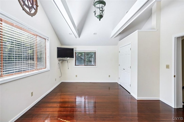 2761 E Lake Rd, Skaneateles, NY 13152 - empty room with lofted ceiling and wood finished floors