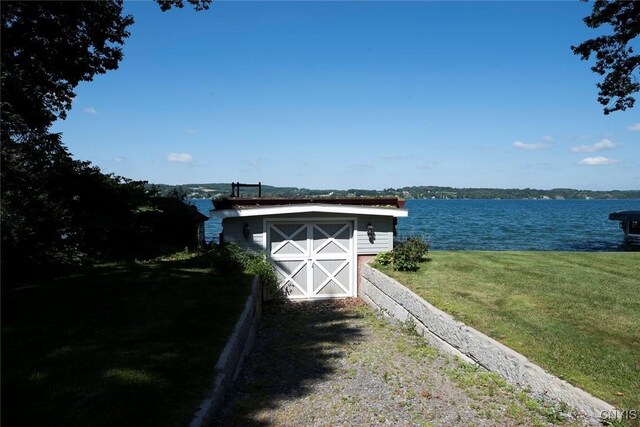 2761 E Lake Rd, Skaneateles, NY 13152 - view of outbuilding with a water view