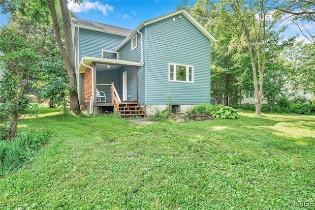 12 Clark St, Perry, NY 14530 - rear view of house with a yard