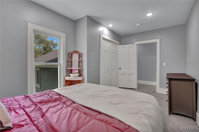 12 Clark St, Perry, NY 14530 - bedroom with light colored carpet, recessed lighting, and a closet