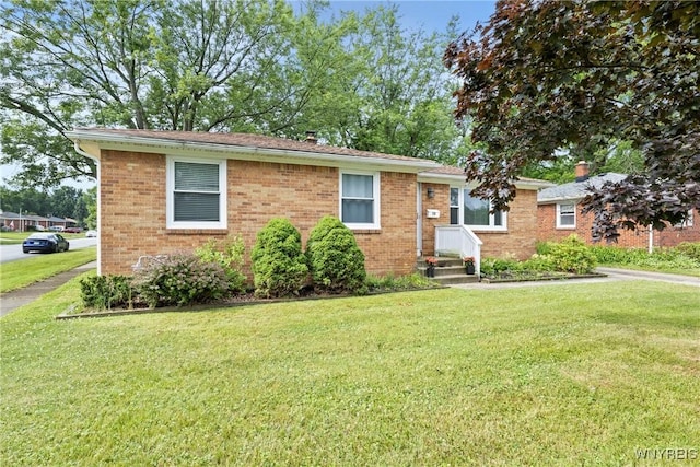 73 Willowcrest Dr, West Seneca, NY 14224 - ranch-style house with a front yard and brick siding