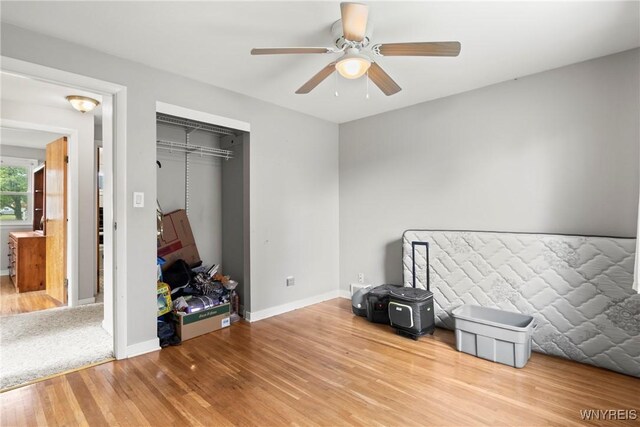 73 Willowcrest Dr, West Seneca, NY 14224 - unfurnished bedroom featuring wood finished floors, a closet, and a ceiling fan