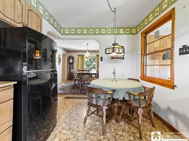 5005 W Main Rd, Pomfret, NY 14063 - dining room with arched walkways and baseboards